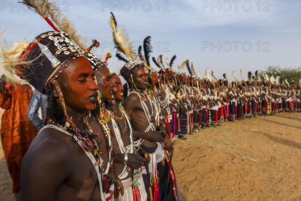 Wodaabe-Bororo men with faces painted at the annual Gerewol festival