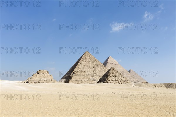 The three main pyramids with the three queen's pyramids in the foreground