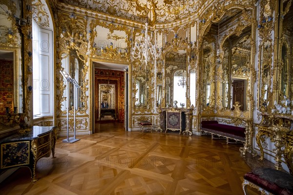 Artfully decorated mirror cabinet