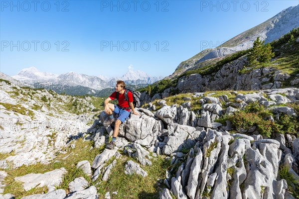 Hiker sitting on a stone