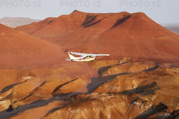 Little airplane over Skeleton coast, Kuidas, Namibia