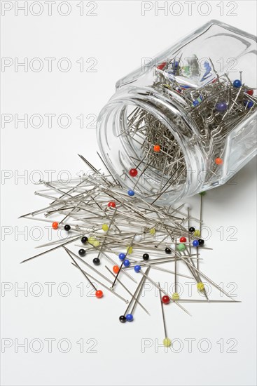 Pins in glass jar