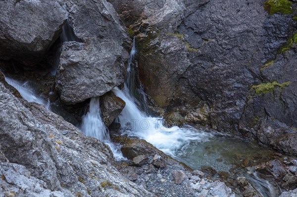 Waterfall in the rocky gorge Val d'Uina