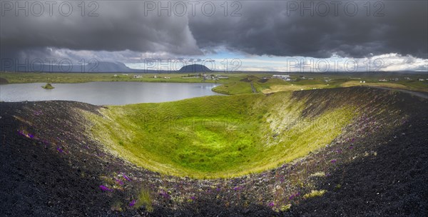 Volcanic crater with green moss