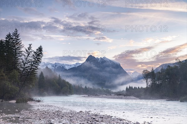 River Soca with Svinjak Mountain in the morning