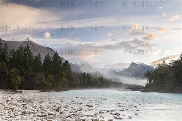 River Soca with Svinjak Mountain in the morning