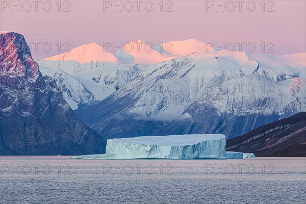 Iceberg in fjord