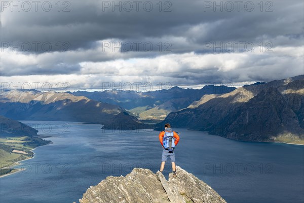 Hiker stands on a rock