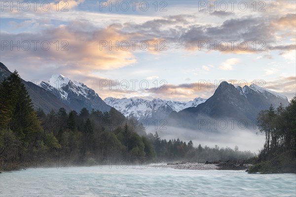 River Soca with Svinjak Mountain in the morning