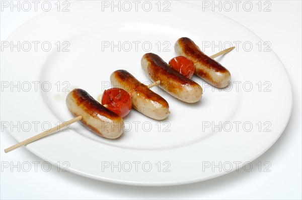 Chipolata sausages on wooden skewers