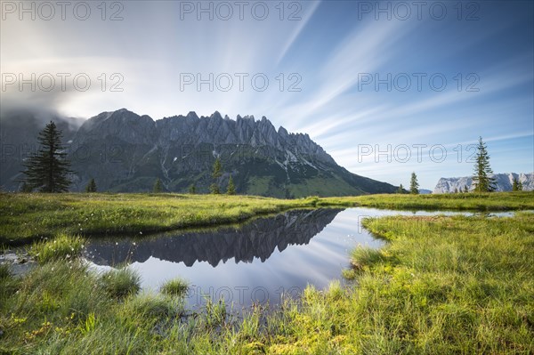 Mandelwand reflected in lake