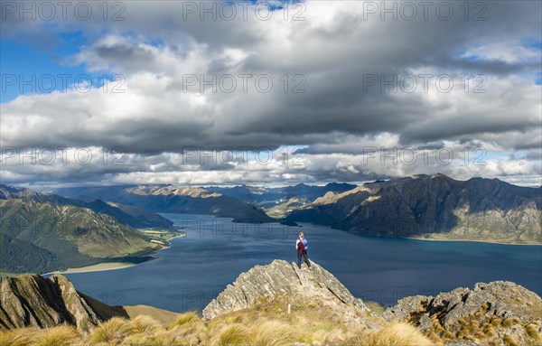Hiker stands on a rock
