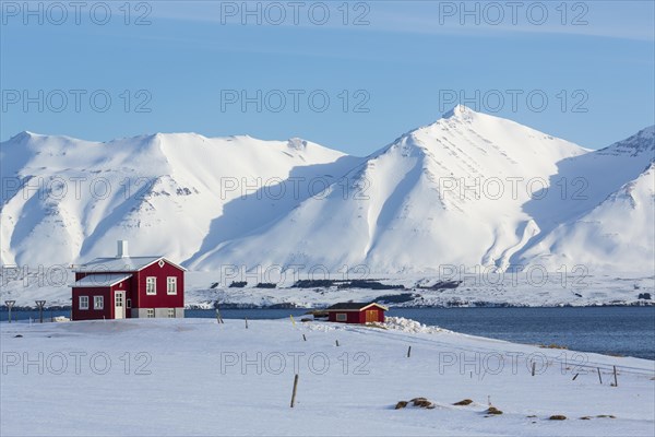 Lonely red house on the Akureyrifjord