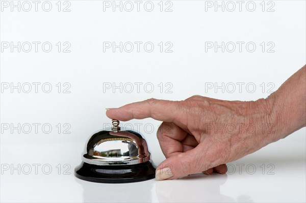 Hand rings table bell