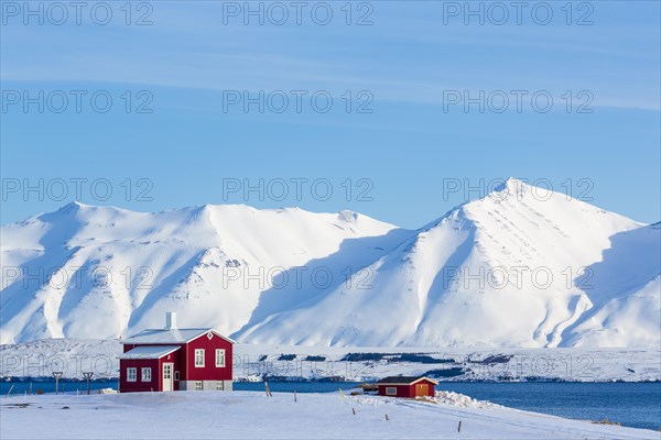 Lonely red house on the Akureyrifjord