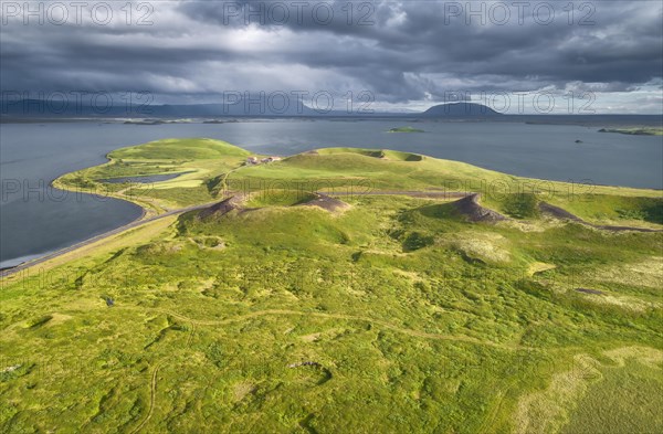 Aerial view of green volcanic crater