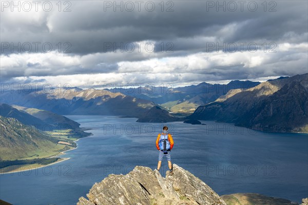 Hiker stands on a rock