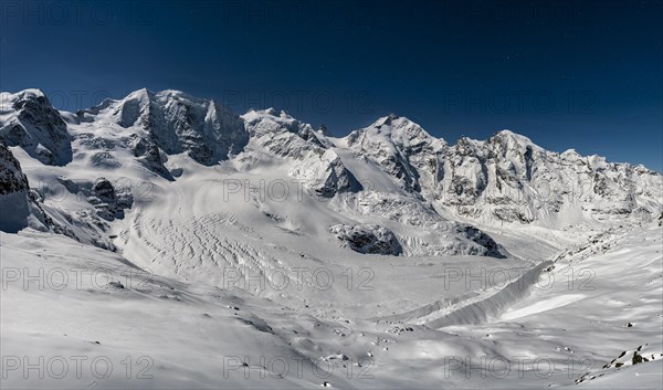 Winter mountain panorama on the Diavolezza at full moon