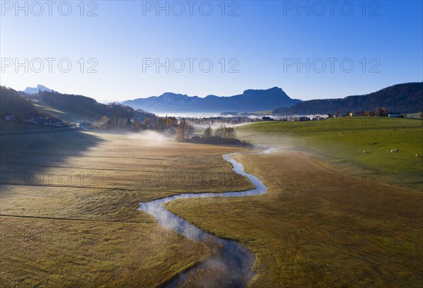 Outflow of the Zellerache from the Irrsee lake with view into the Mondseeland