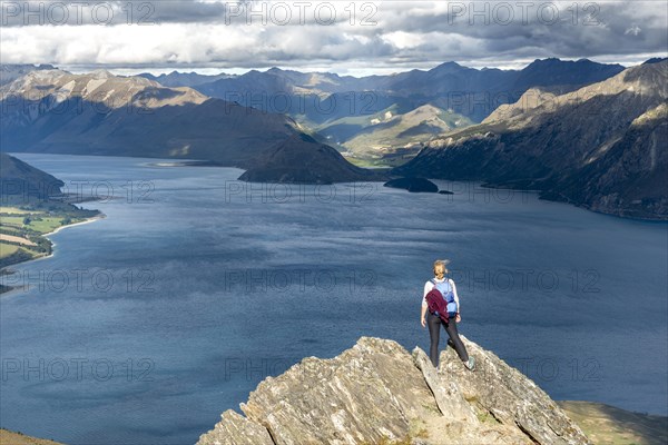 Hiker stands on a rock