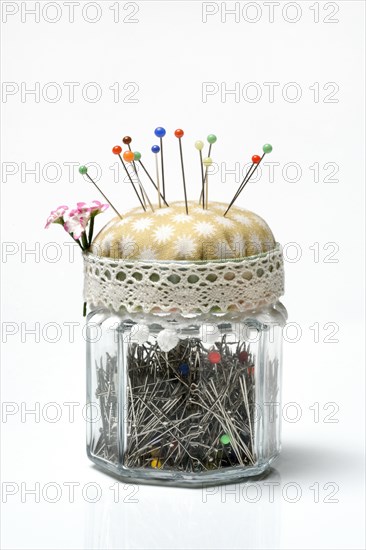 Pincushion with glass jar