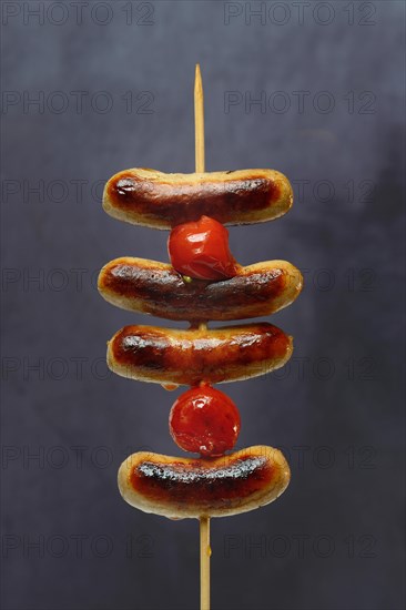 Chipolata sausages on wooden skewers Switzerland