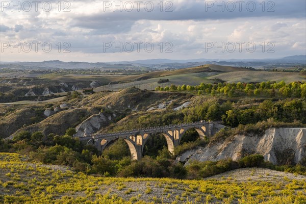 Railway bridge in the hilly landscape of the Crete Senesi