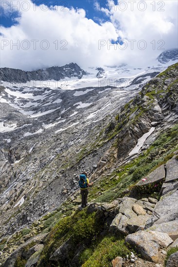 Hiker on marked hiking trail