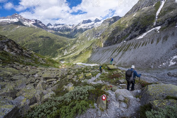 Hiker on marked hiking trail