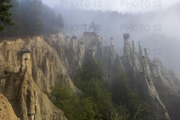 Earth pyramids near Perchau in the mist