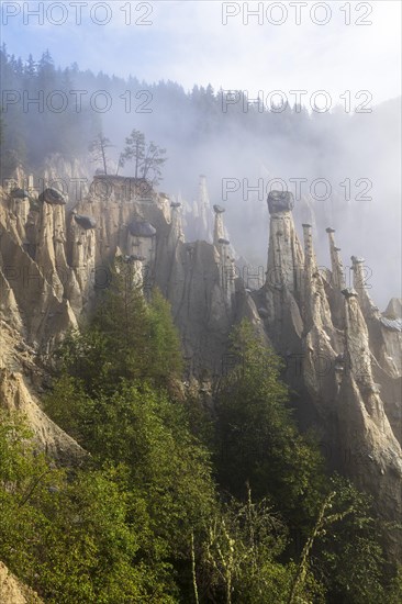 Earth pyramids near Perchau in the mist