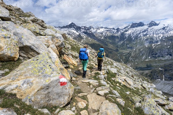 Hiker on marked hiking trail