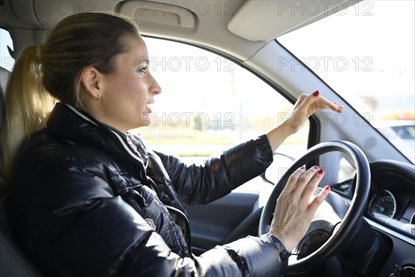 Young woman at the wheel