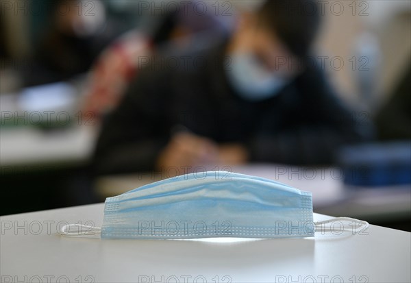 Face mask on school desk