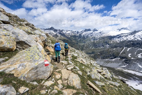 Hiker on marked hiking trail