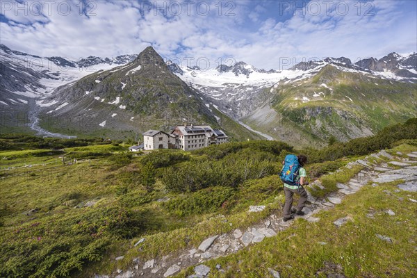 Hiker in front of the Berliner Huette