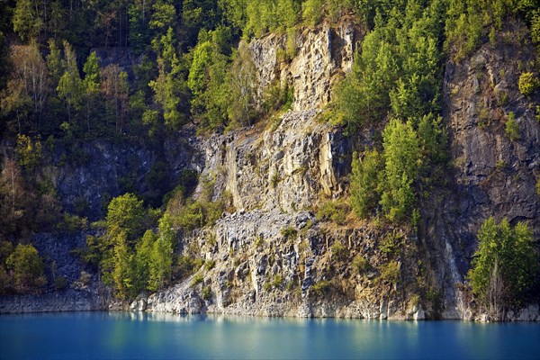 Steep face at the Prangenhaus limestone quarry with lake