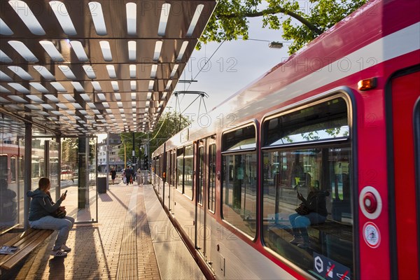 Tram of the Rheinbahn at the stop Nikolaus-Kopp-Platz in the district Heerdt