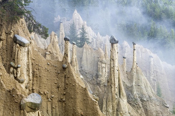 Earth pyramids near Perchau in the mist