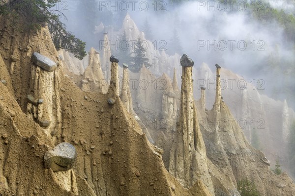 Earth pyramids near Perchau in the mist