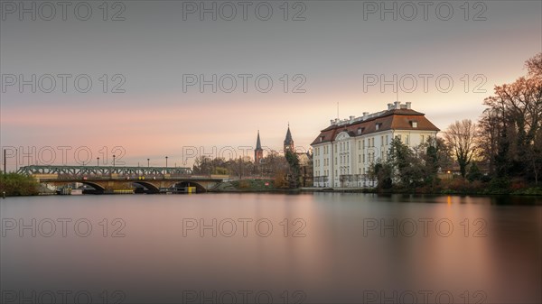 View over the Dahme River to the Koepenick Castle and the Lange Bruecke in Berlin in the morning