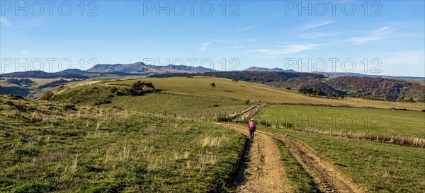 Walker and the Sancy massif at back