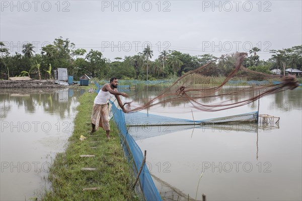 Man casts net