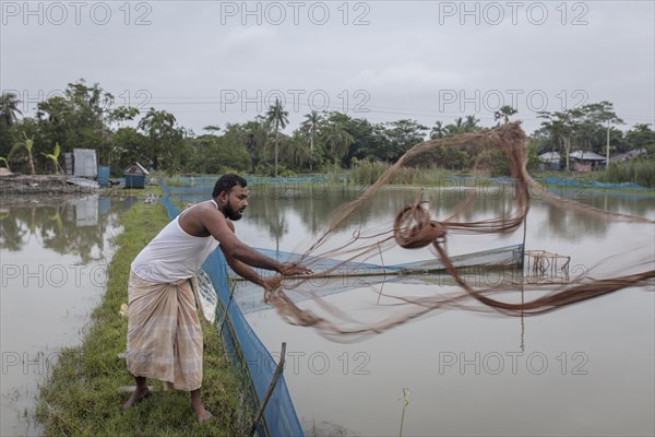 Man casts net