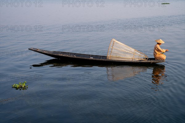 Traditional fisherman on his small boat