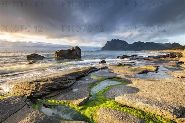 Rocks on the beach of Uttakleiv at evening light