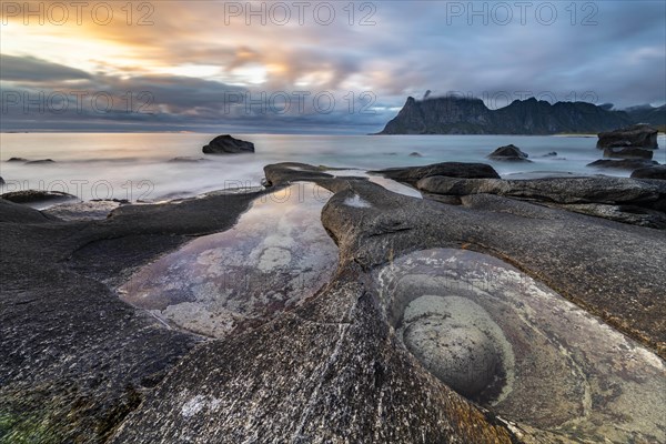 Rocks on the beach of Uttakleiv at evening light