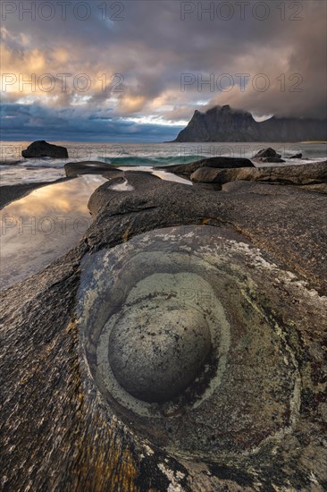 Rocks on the beach of Uttakleiv at evening light