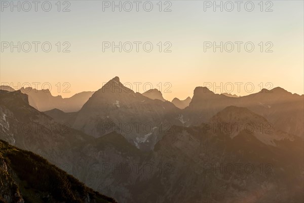 Sunset behind mountain silhouette