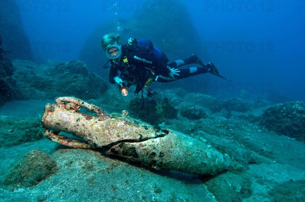 Divers and antique amphora type Dressel 2-4